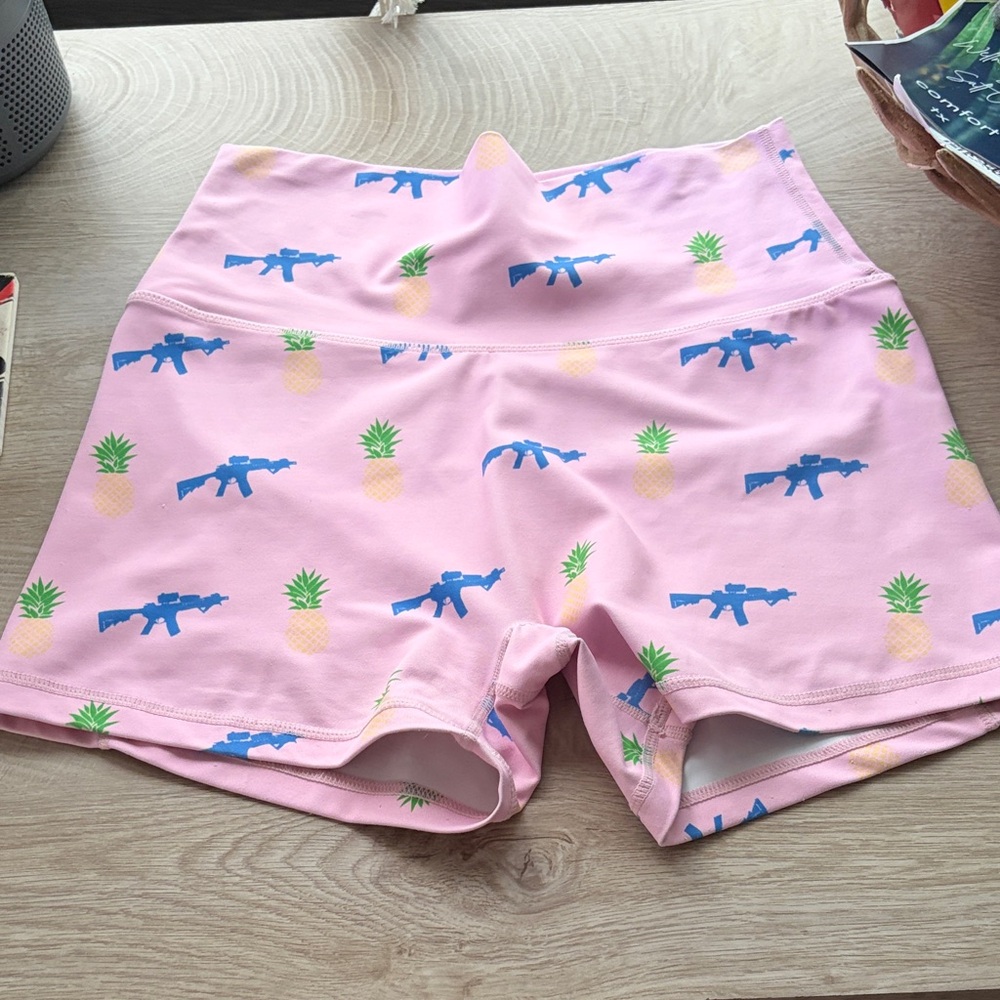 Vibrant Pink Women's Athletic Shorts with Blue and Yellow Accents